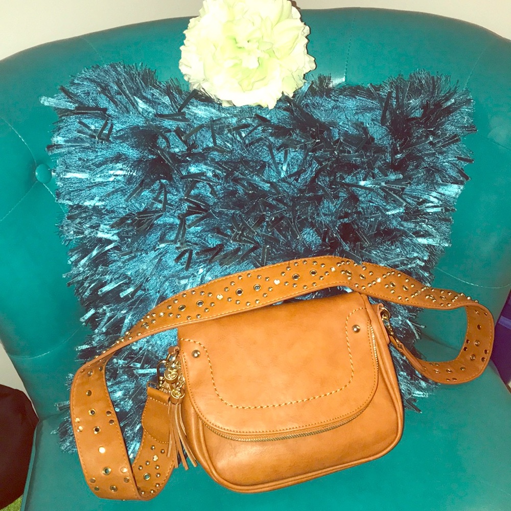 Brown crossbody with gold studs on shoulder strap